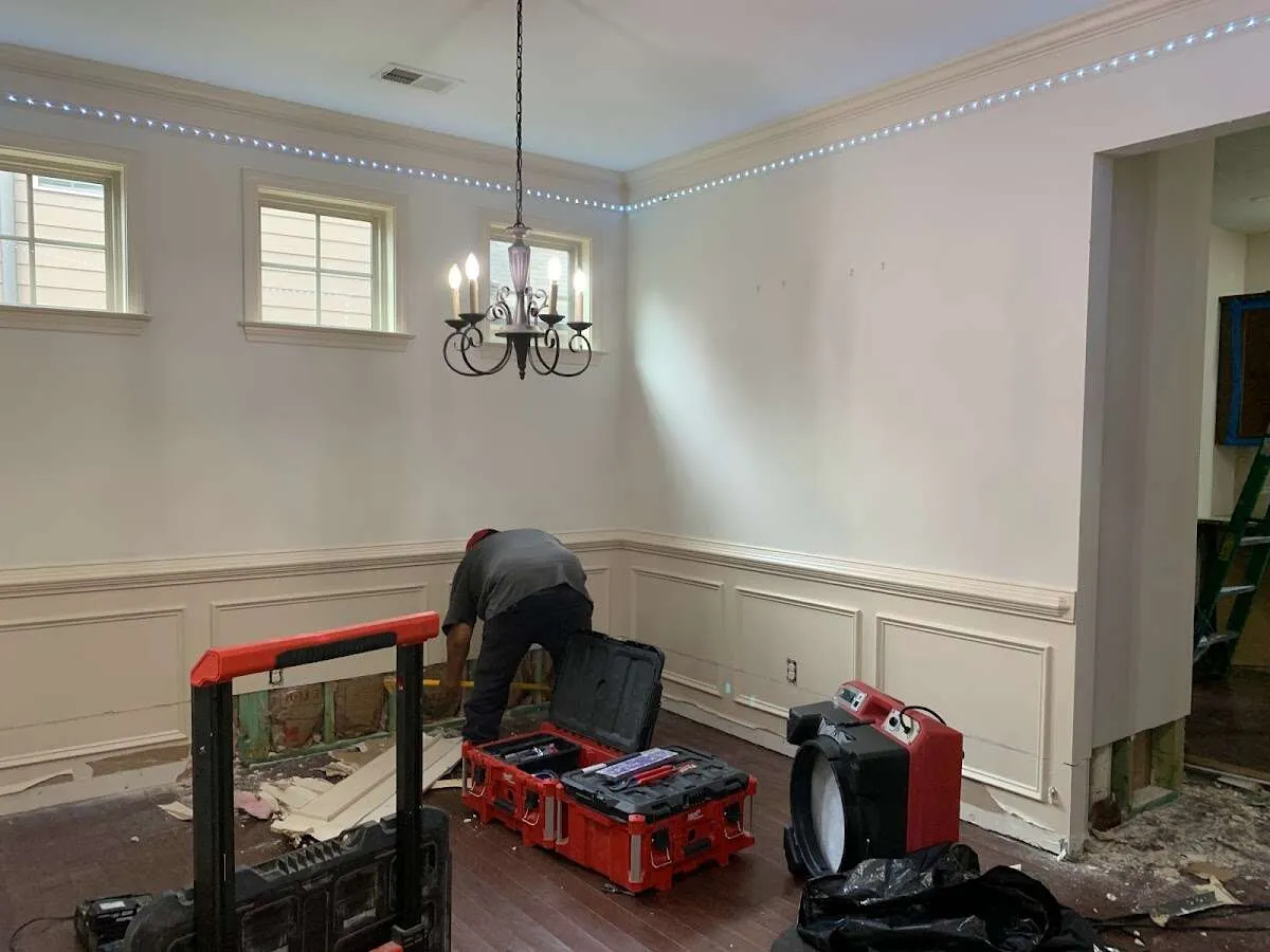 Restoration technician with professional equipment in Spring Hill